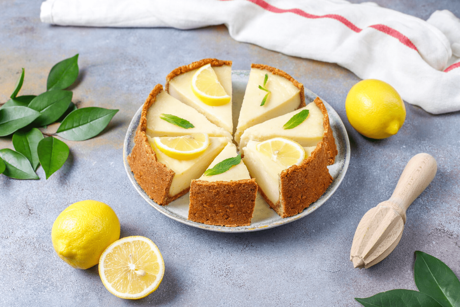 Enjoy a slice of our delicious Lemon Cheesecake.